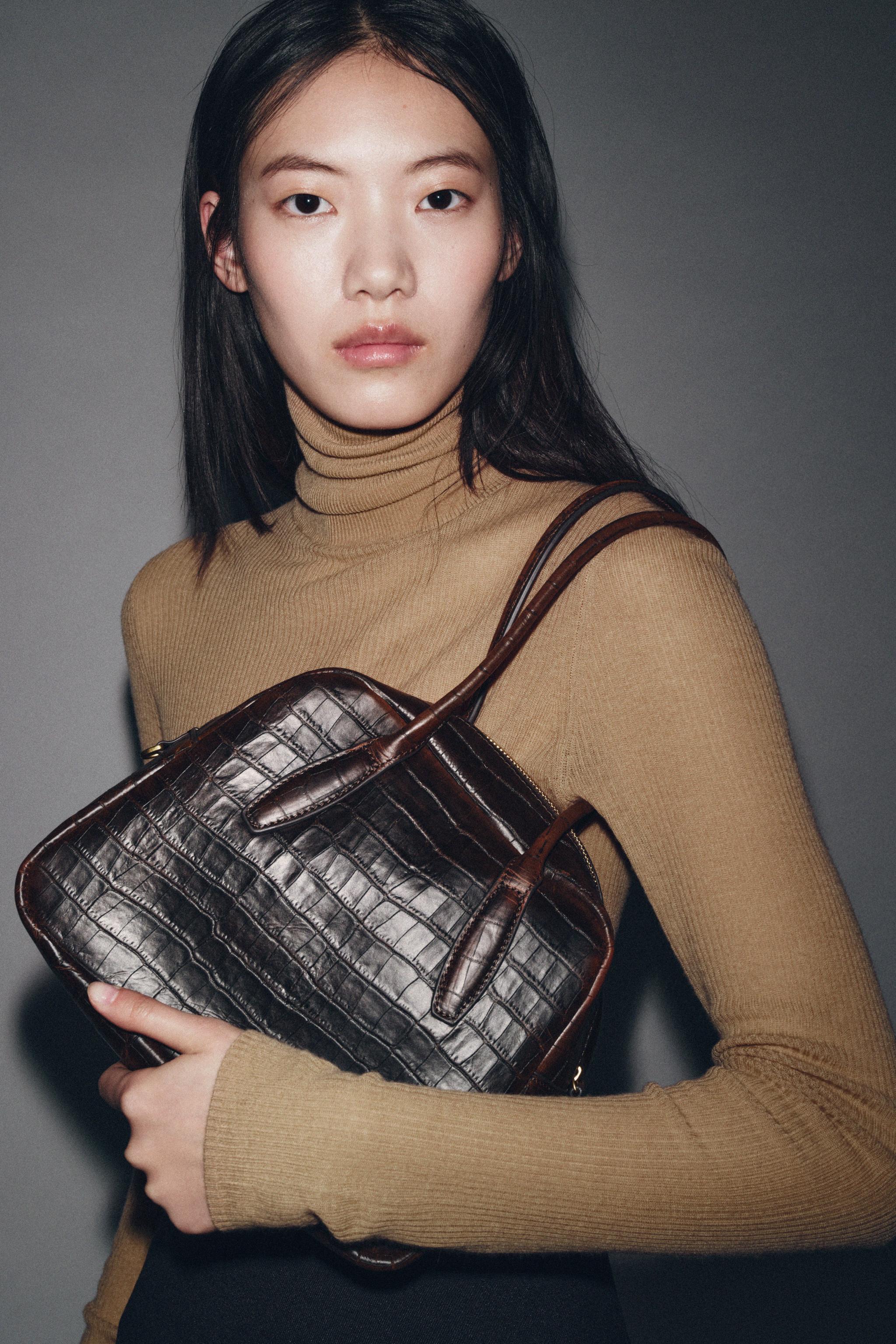 EMBOSSED LEATHER BOWLING BAG